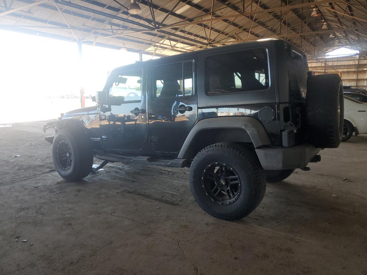 2012 Jeep Wrangler Unlimited Rubicon - Image 2
