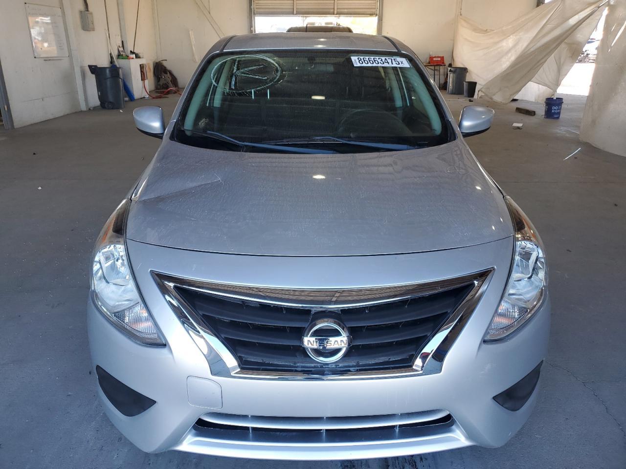 2015 Nissan Versa S - Фото 5