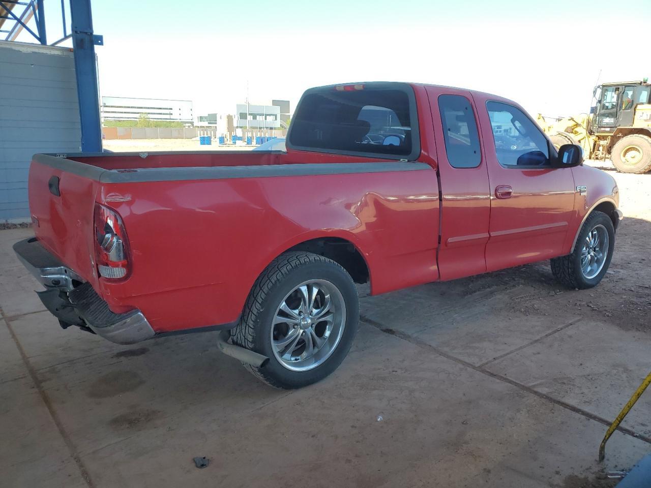 2002 Ford F150 - Фото 3