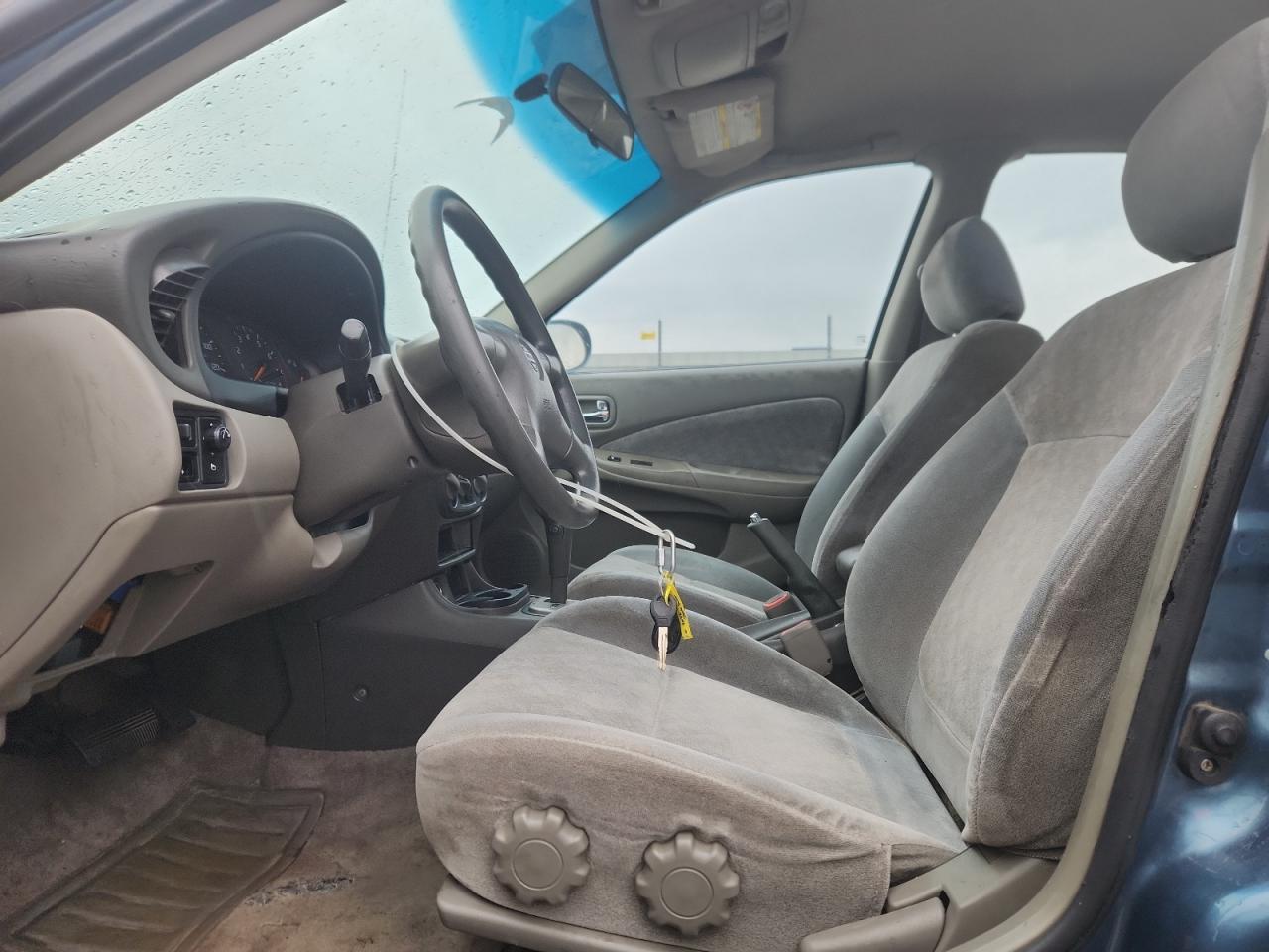 2002 Nissan Sentra Gxe - Фото 7