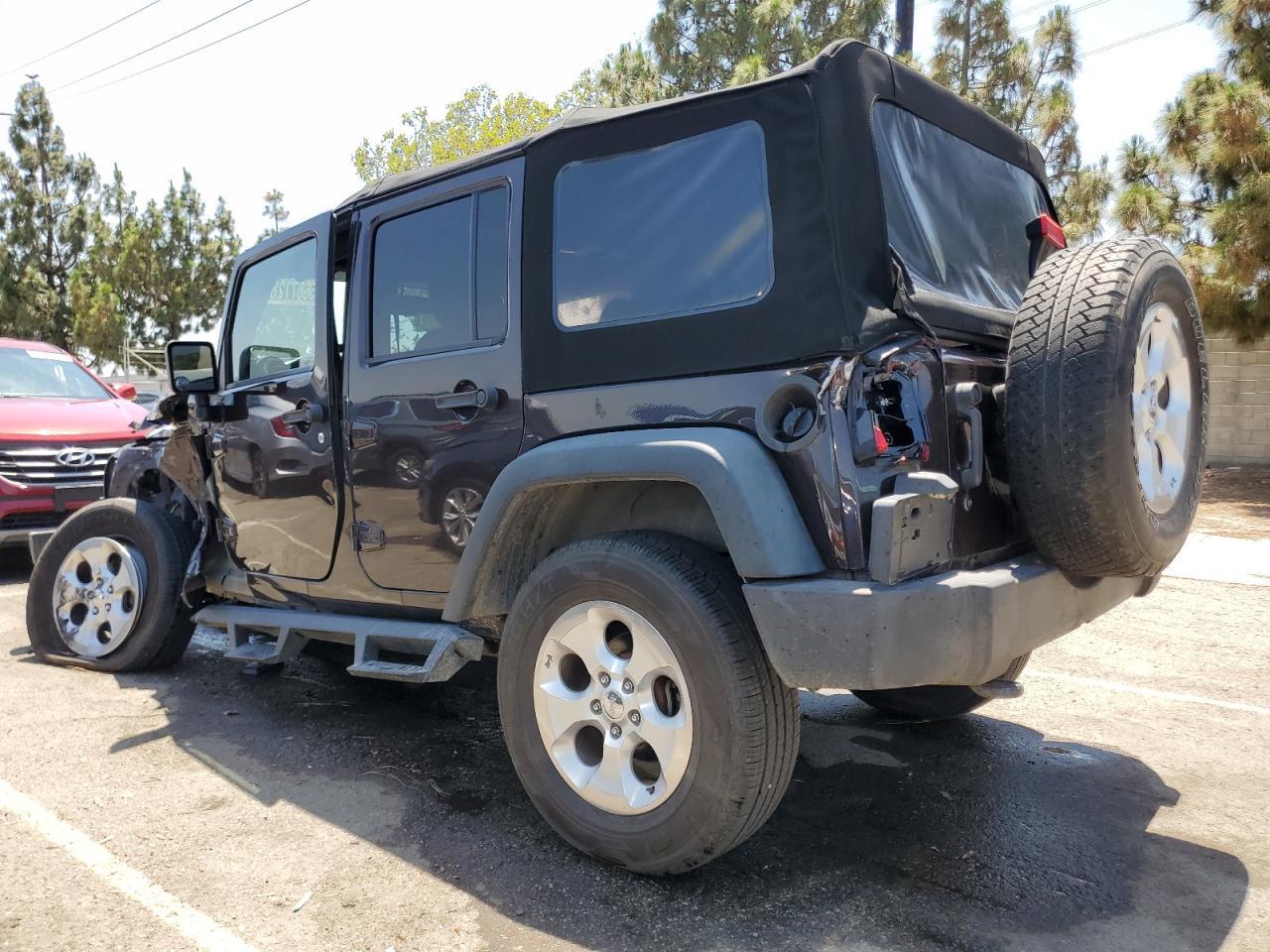 2013 Jeep Wrangler Unlimited Sport - Фото 2