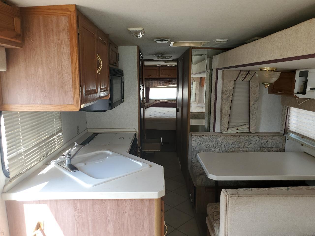 1999 Ford Super Duty F-550 Mot - Фото 6