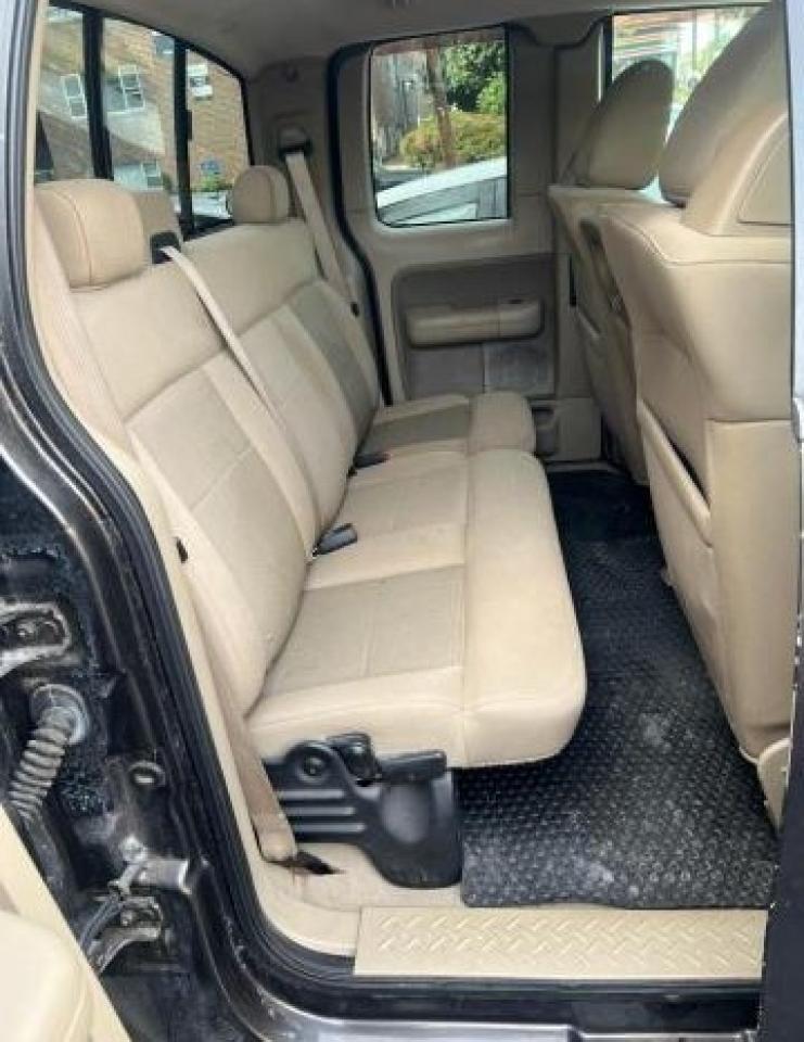 2006 Ford F150 - Фото 6