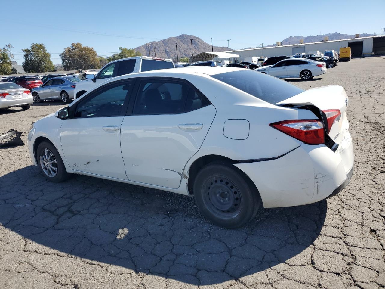 2014 Toyota Corolla L - Фото 2