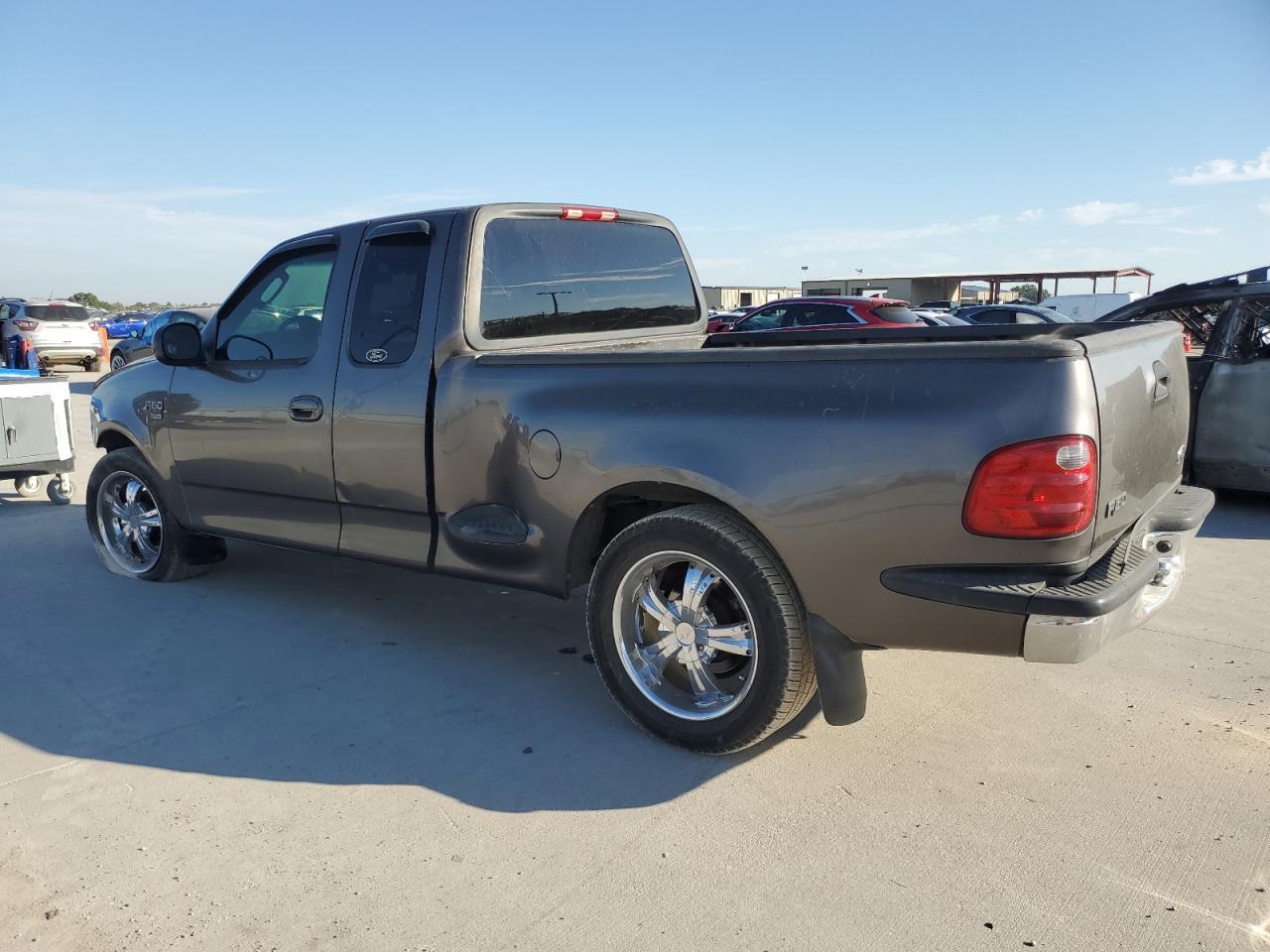 2003 Ford F150 - Фото 2
