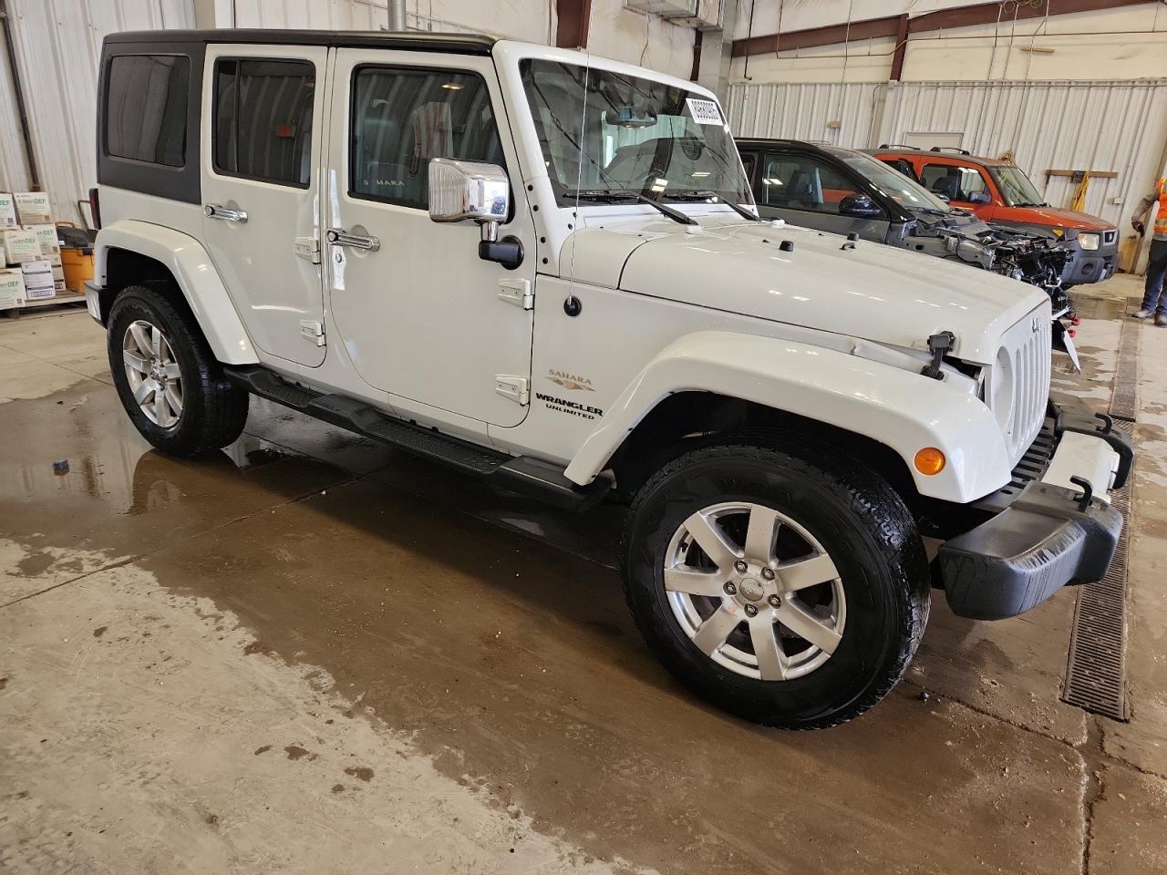 2013 Jeep Wrangler Unlimited Sahara - Фото 4
