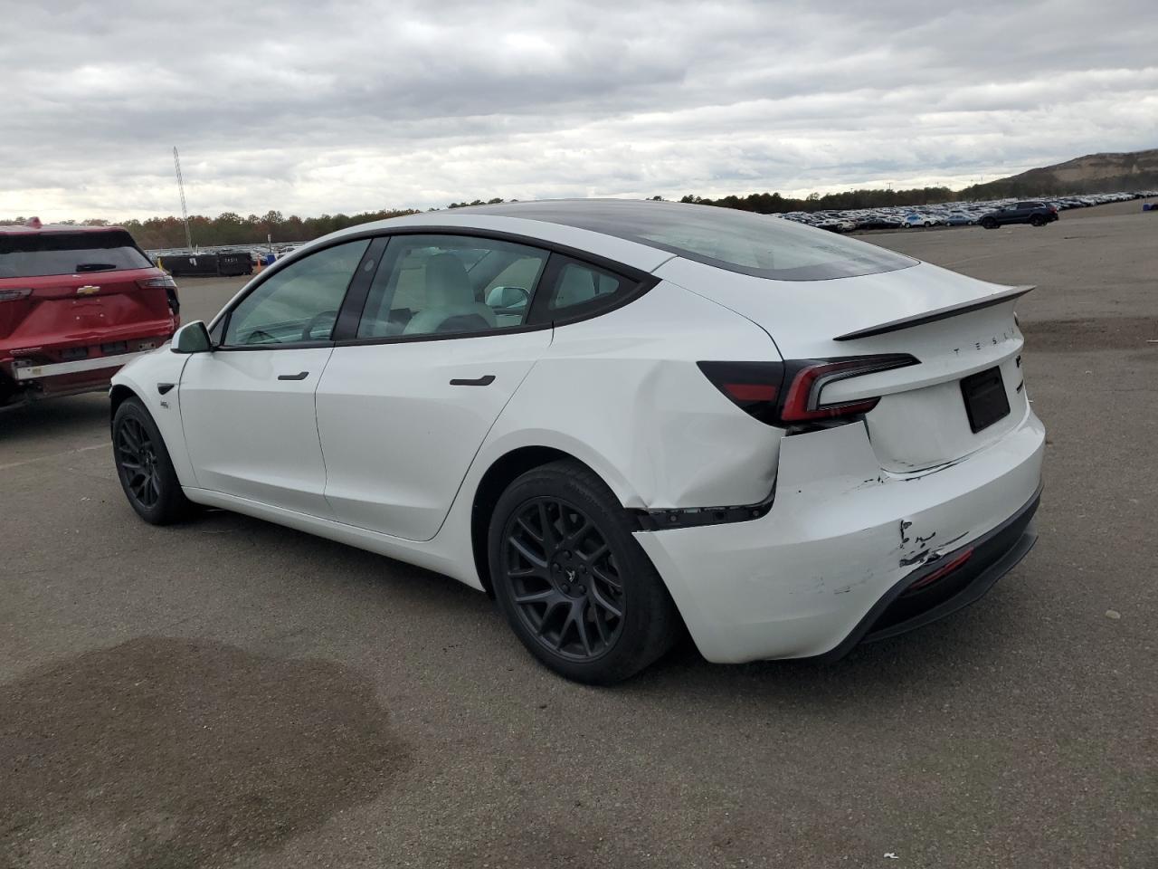 2024 Tesla Model 3 - Фото 2