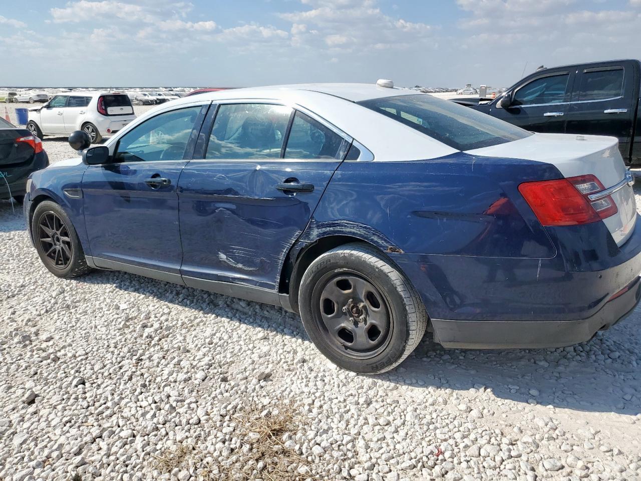 2013 Ford Taurus - Фото 2