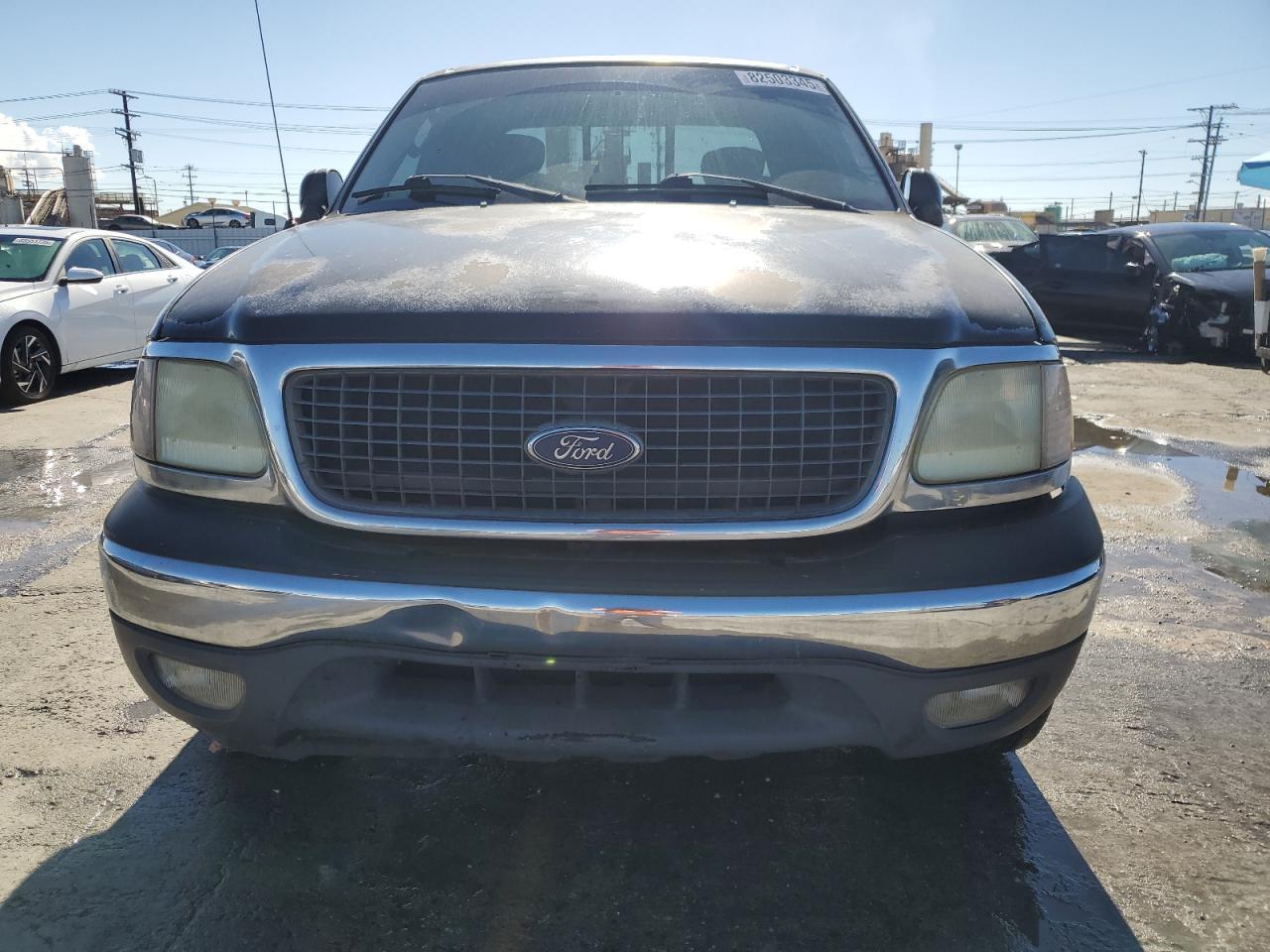 2003 Ford F150 - Фото 5