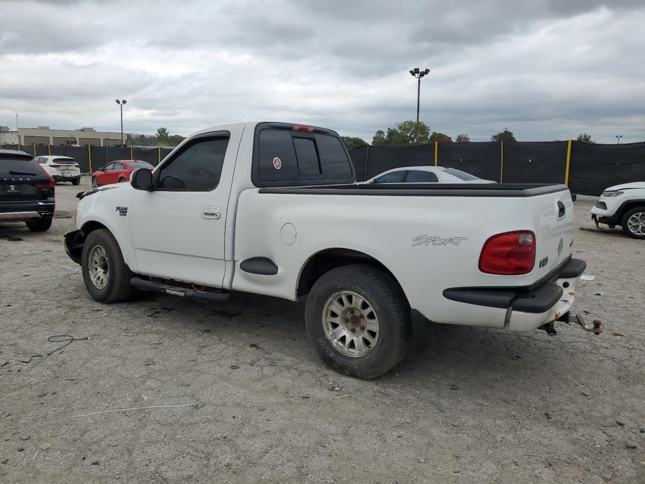 2003 Ford F150 - Фото 2