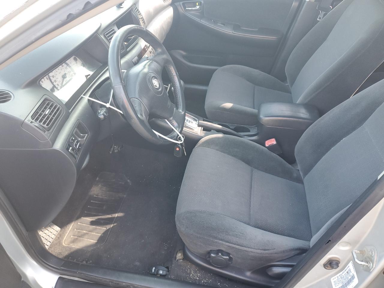 2004 Toyota Corolla Ce - Фото 7