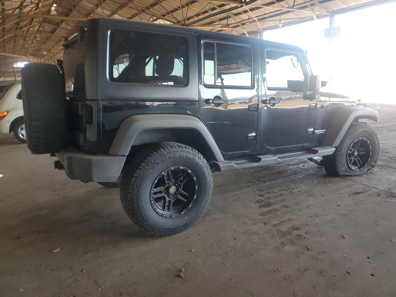 2012 Jeep Wrangler Unlimited Rubicon - Image 3