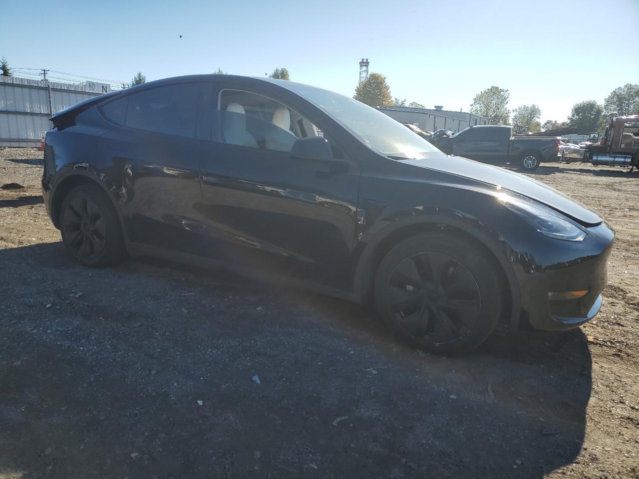 2024 Tesla Model Y - Фото 4