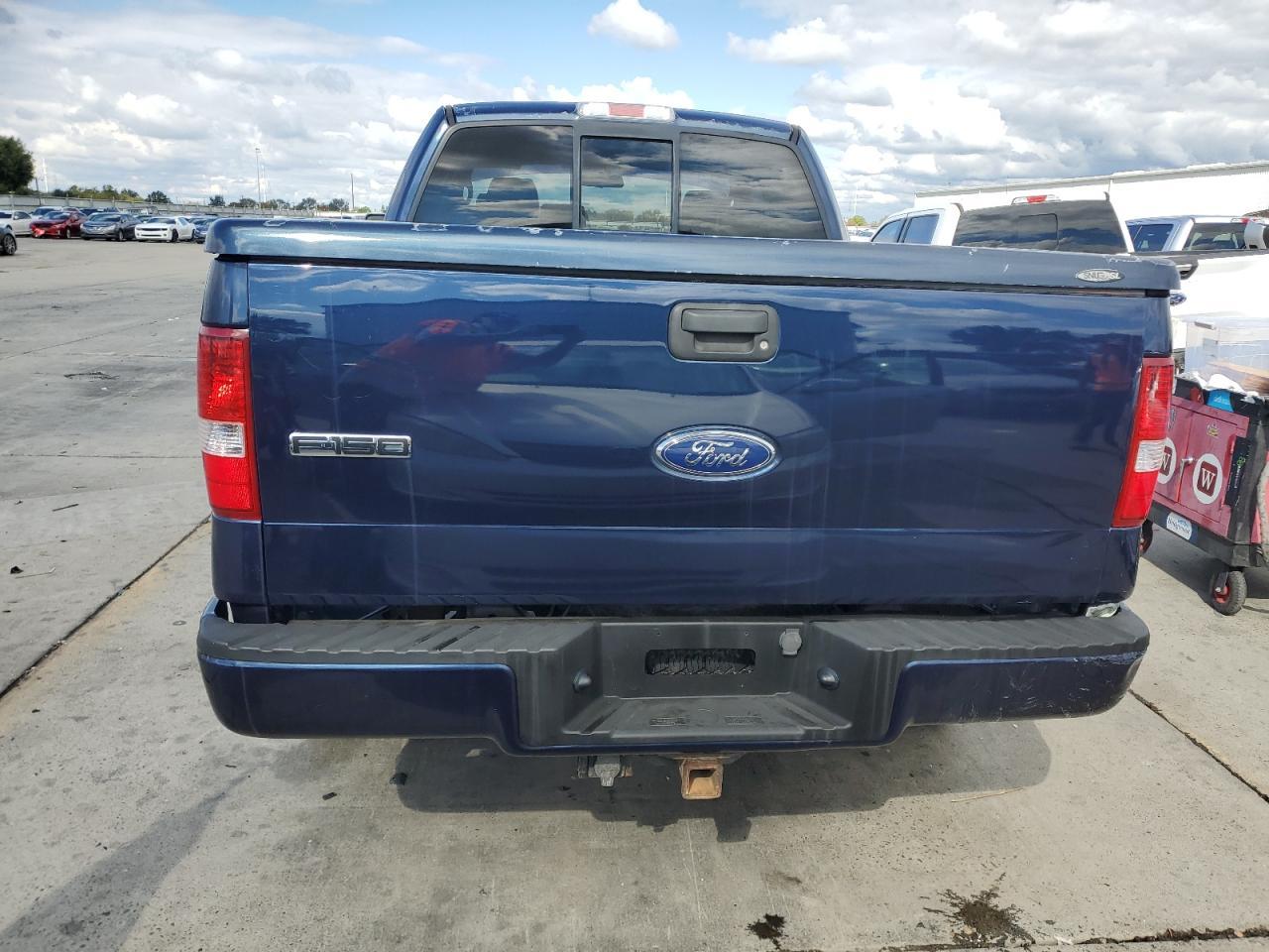 2005 Ford F150 - Фото 6