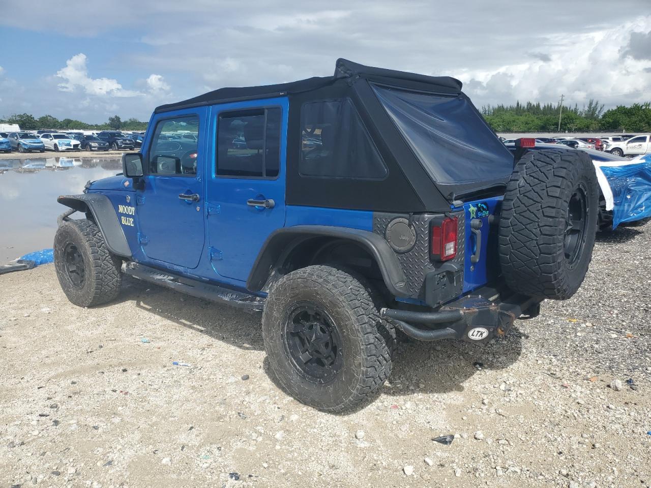 2015 Jeep Wrangler Unlimited Sport - Фото 2