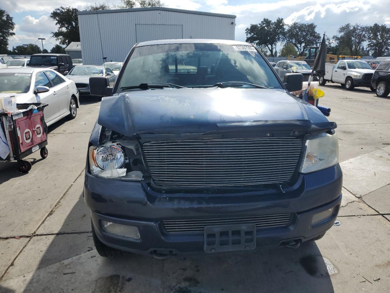 2005 Ford F150 - Фото 5