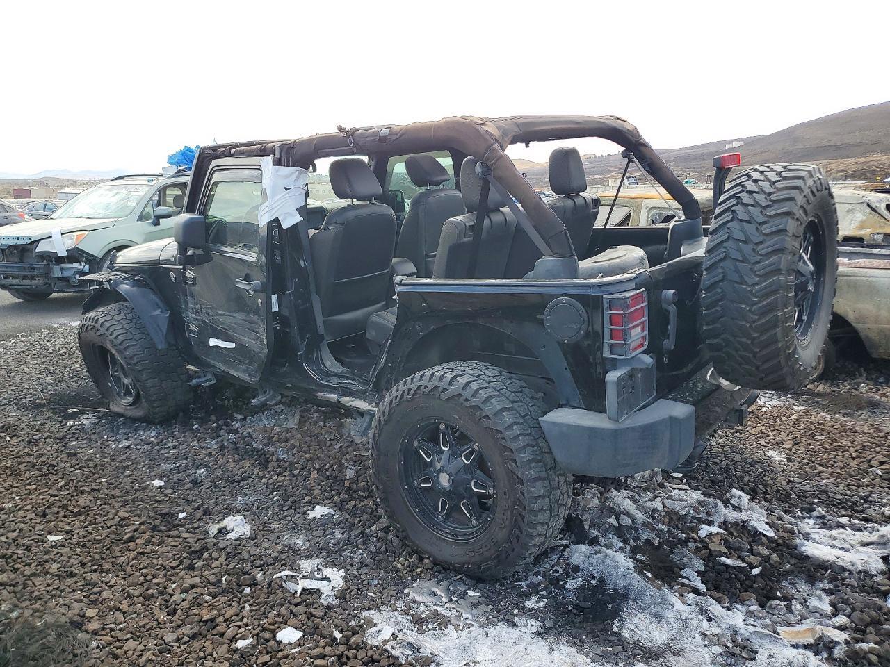 2014 Jeep Wrangler Unlimited Sahara - Фото 2