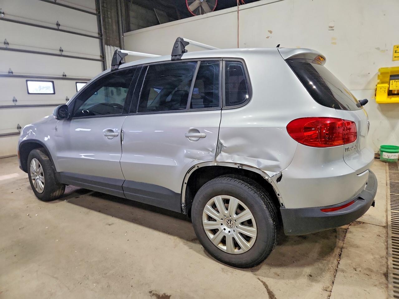 2014 Volkswagen Tiguan S - Фото 2