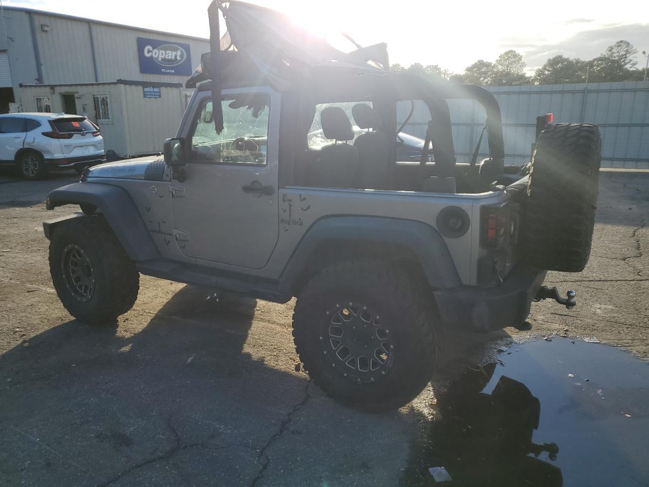 2016 Jeep Wrangler Sport - Фото 2