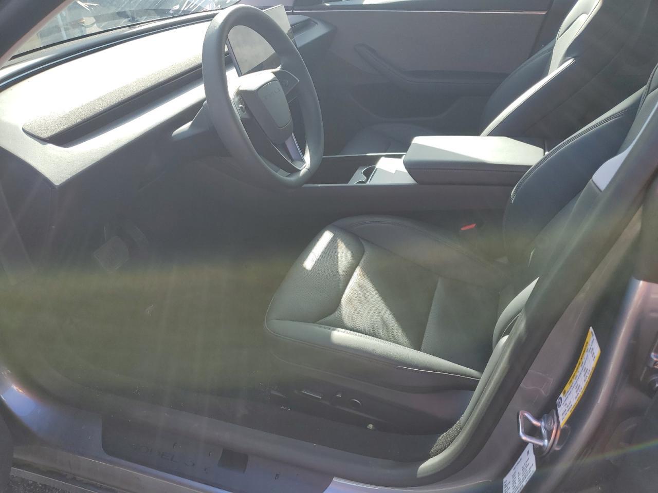 2025 Tesla Model 3 - Фото 7