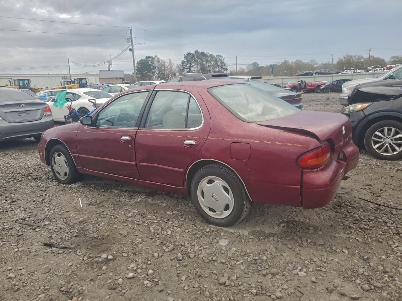1994 Nissan Altima Xe - Фото 2