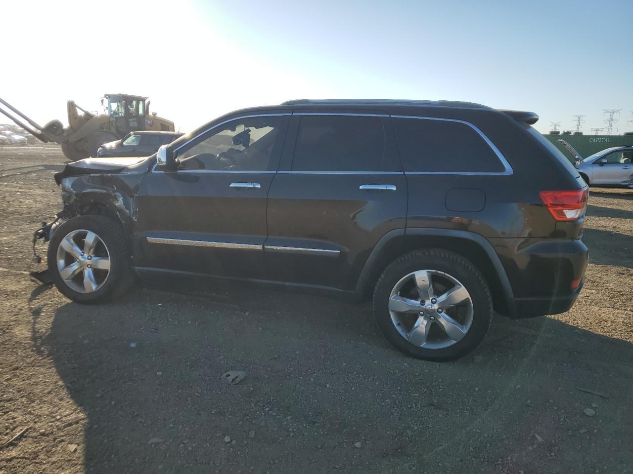 2011 Jeep Grand Cherokee Overland - Фото 2