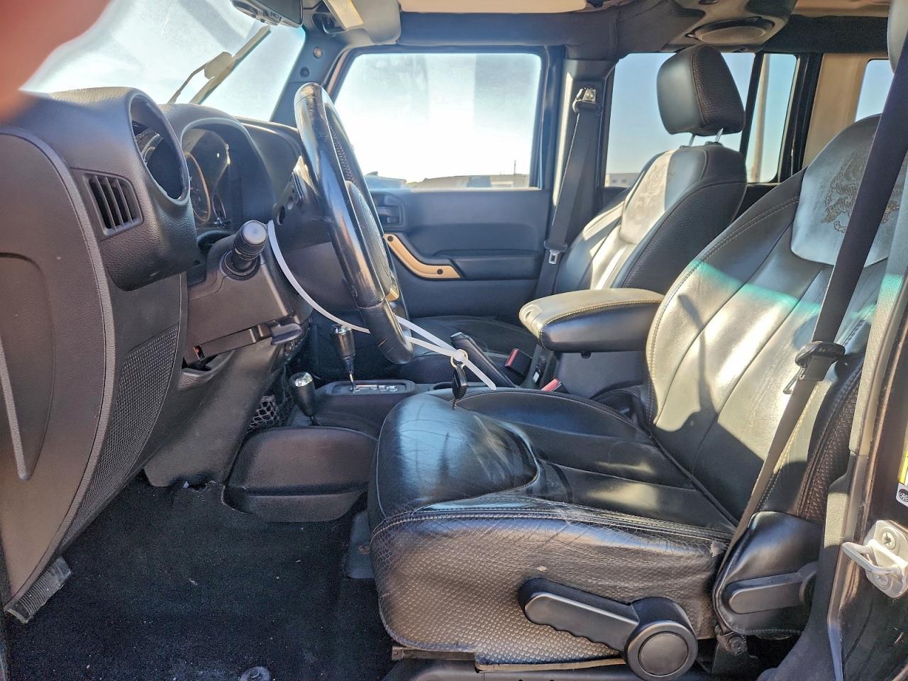 2014 Jeep Wrangler Unlimited Sahara - Фото 7