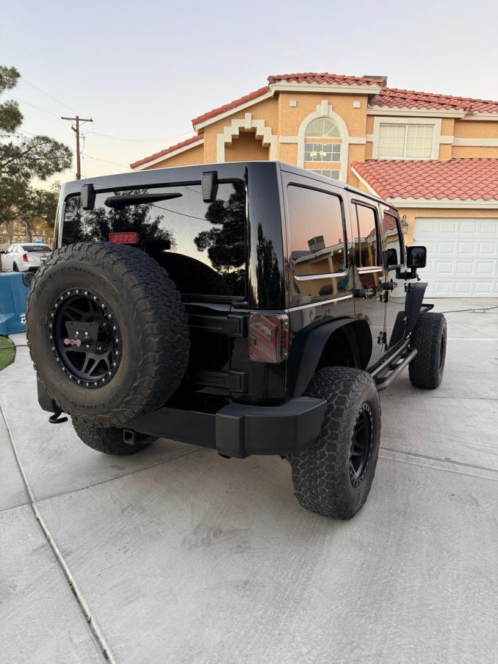 2014 Jeep Wrangler Unlimited Sahara - Фото 4