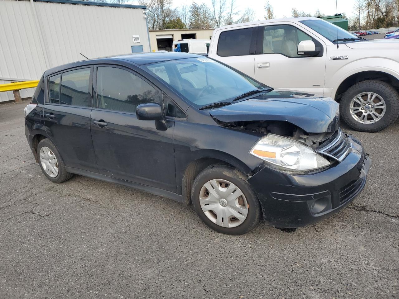 2011 Nissan Versa S - Фото 4
