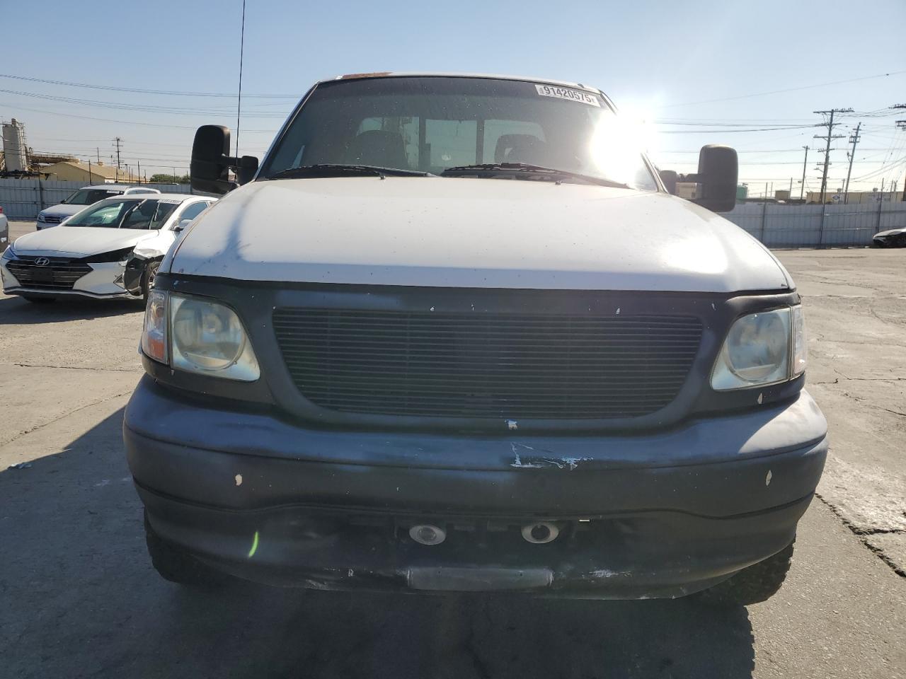 1999 Ford F150 - Фото 5