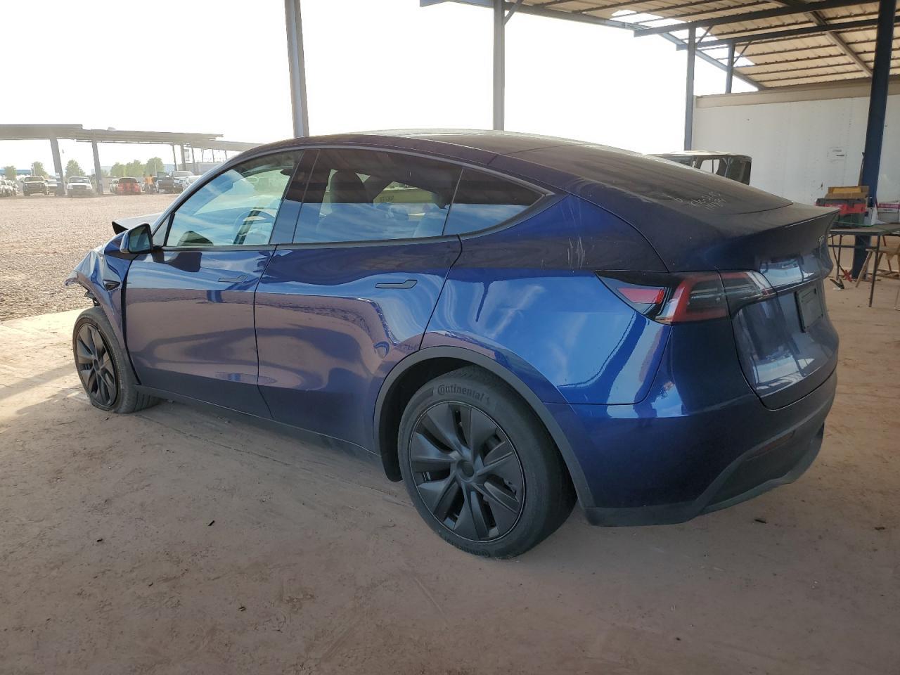 2024 Tesla Model Y - Фото 2