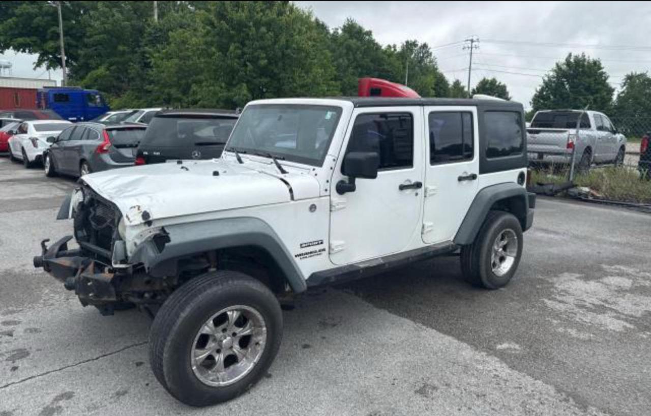 2013 Jeep Wrangler Unlimited Sport - Фото 2