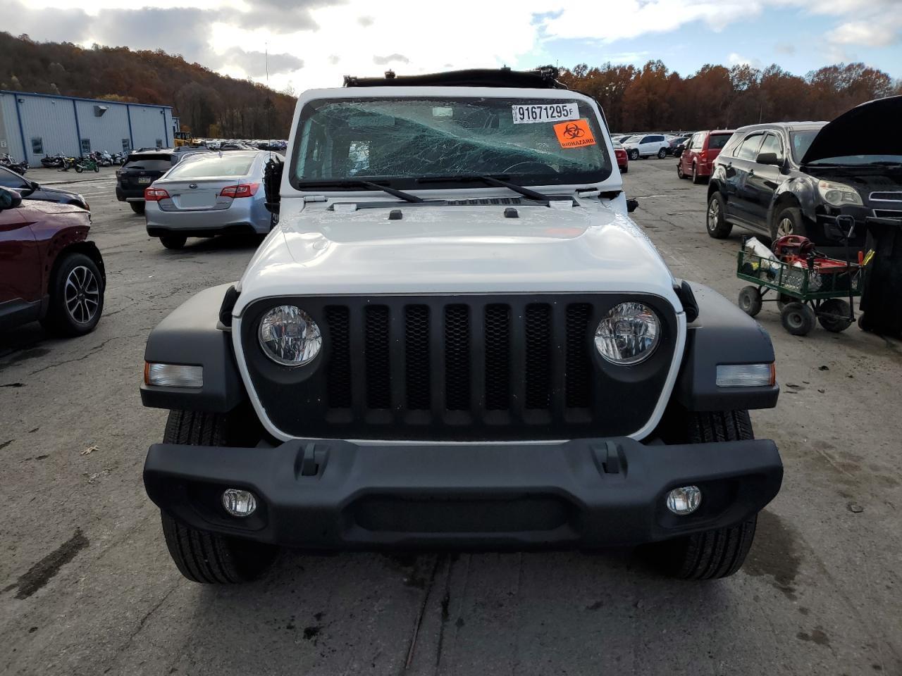 2021 Jeep Wrangler Unlimited Sport - Фото 5