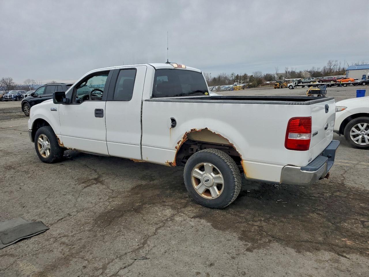 2004 Ford F150 - Фото 2