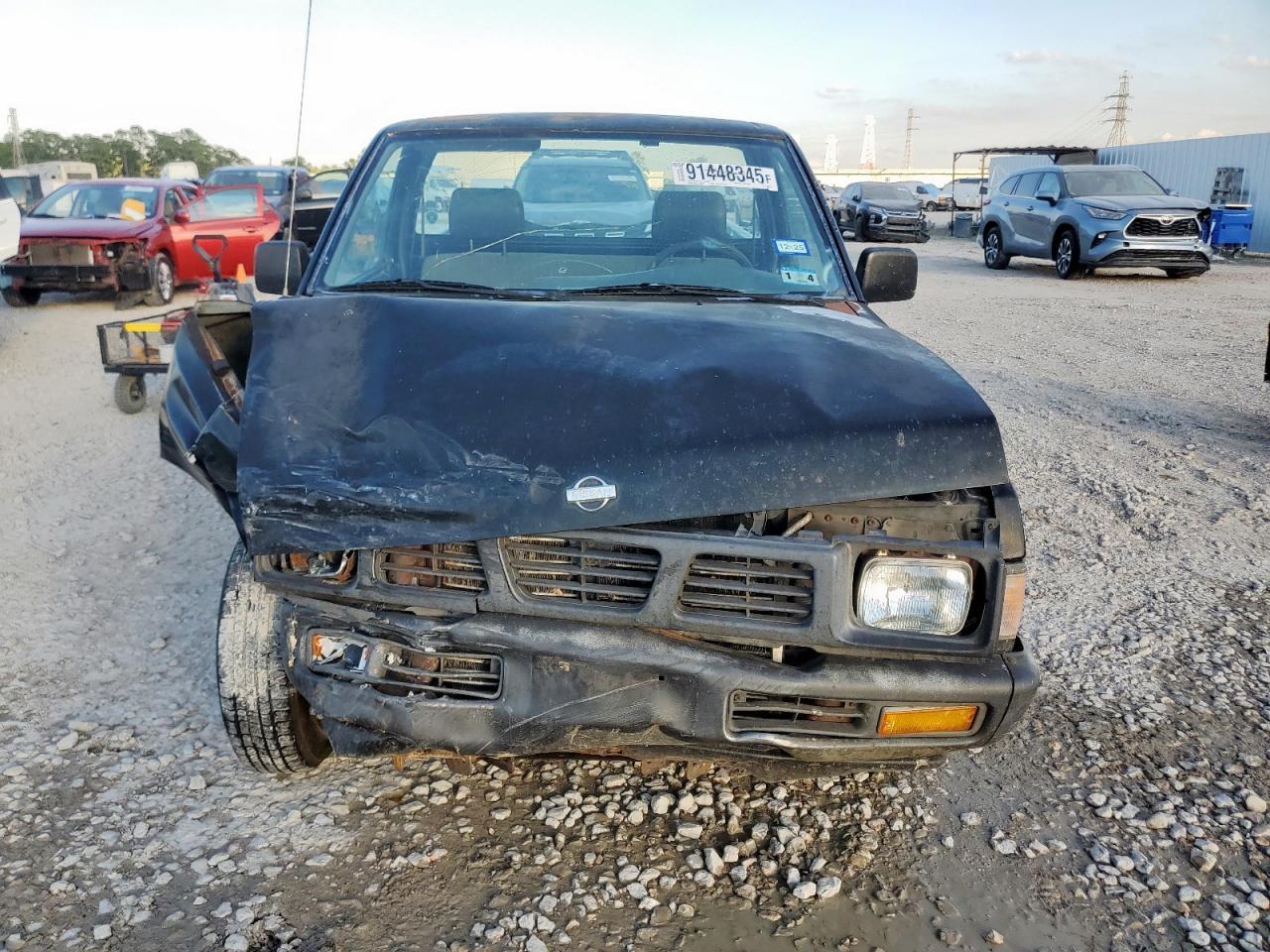 1995 Nissan Truck E/Xe - Фото 5