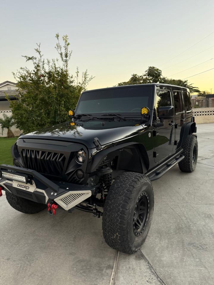 2014 Jeep Wrangler Unlimited Sahara - Фото 2
