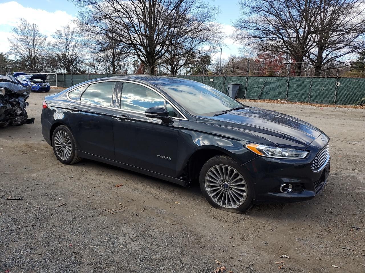 2014 Ford Fusion Titanium Hev - Фото 4