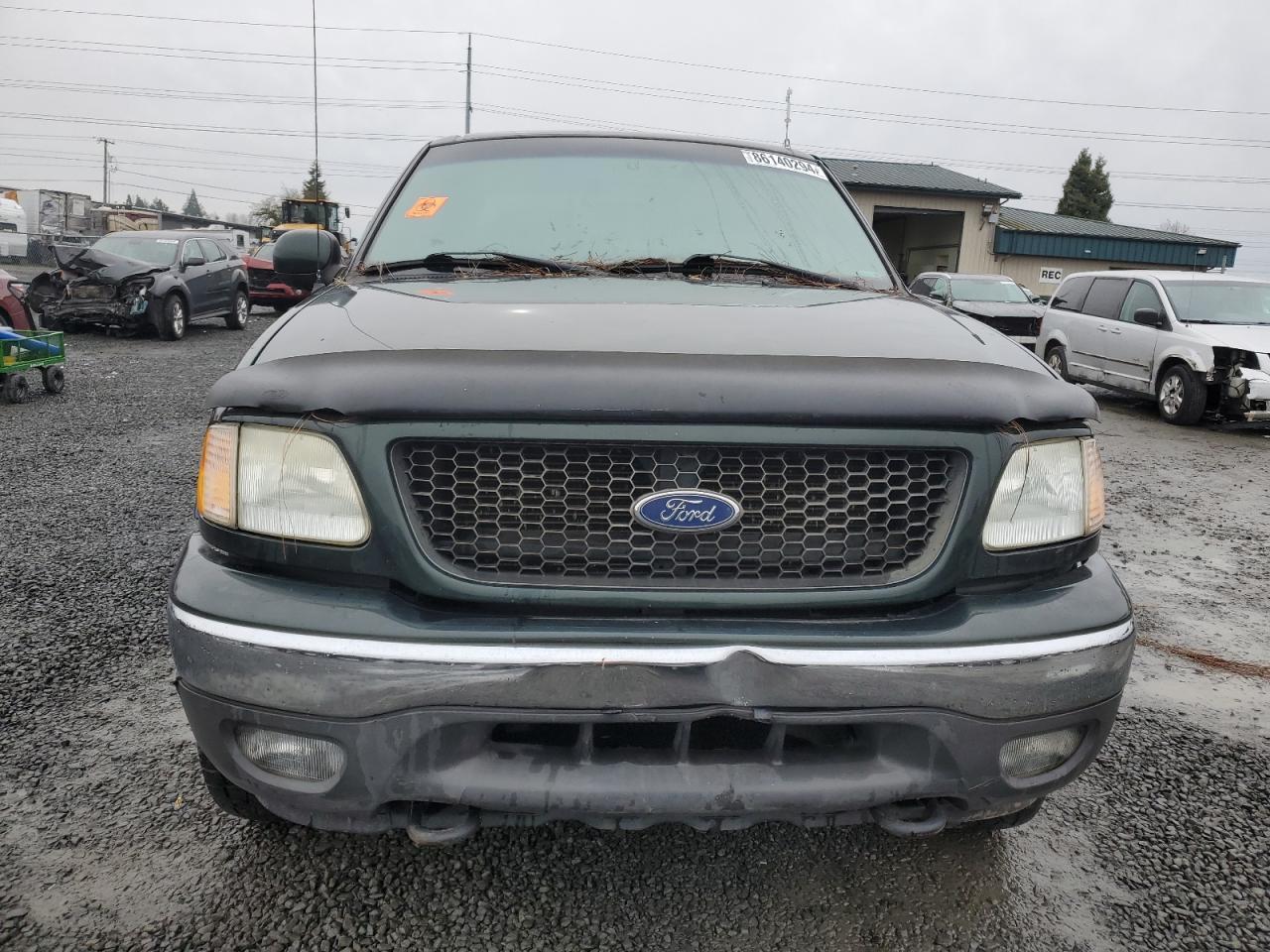 2003 Ford F150 - Фото 5