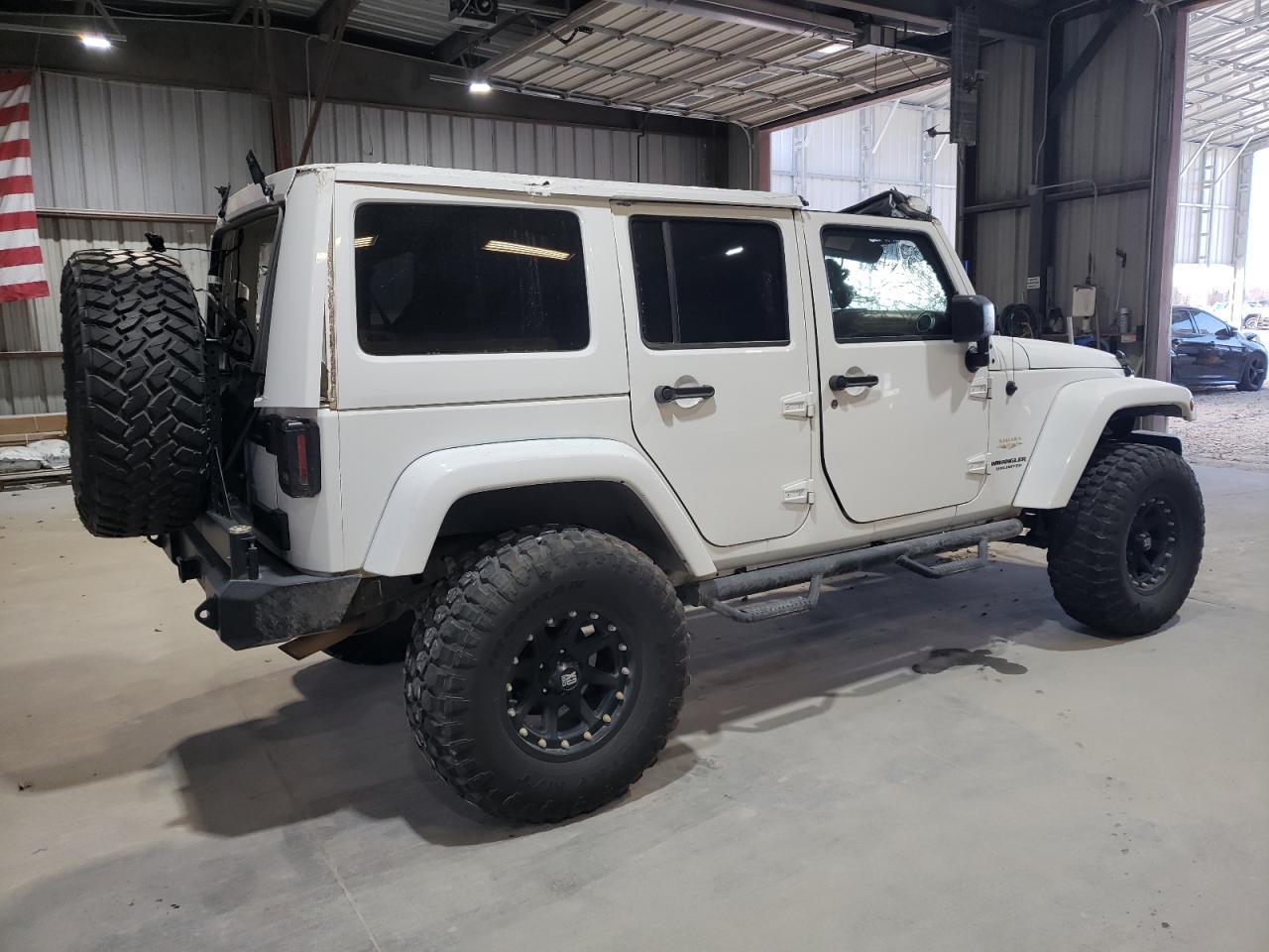 2014 Jeep Wrangler Unlimited Sahara - Фото 3