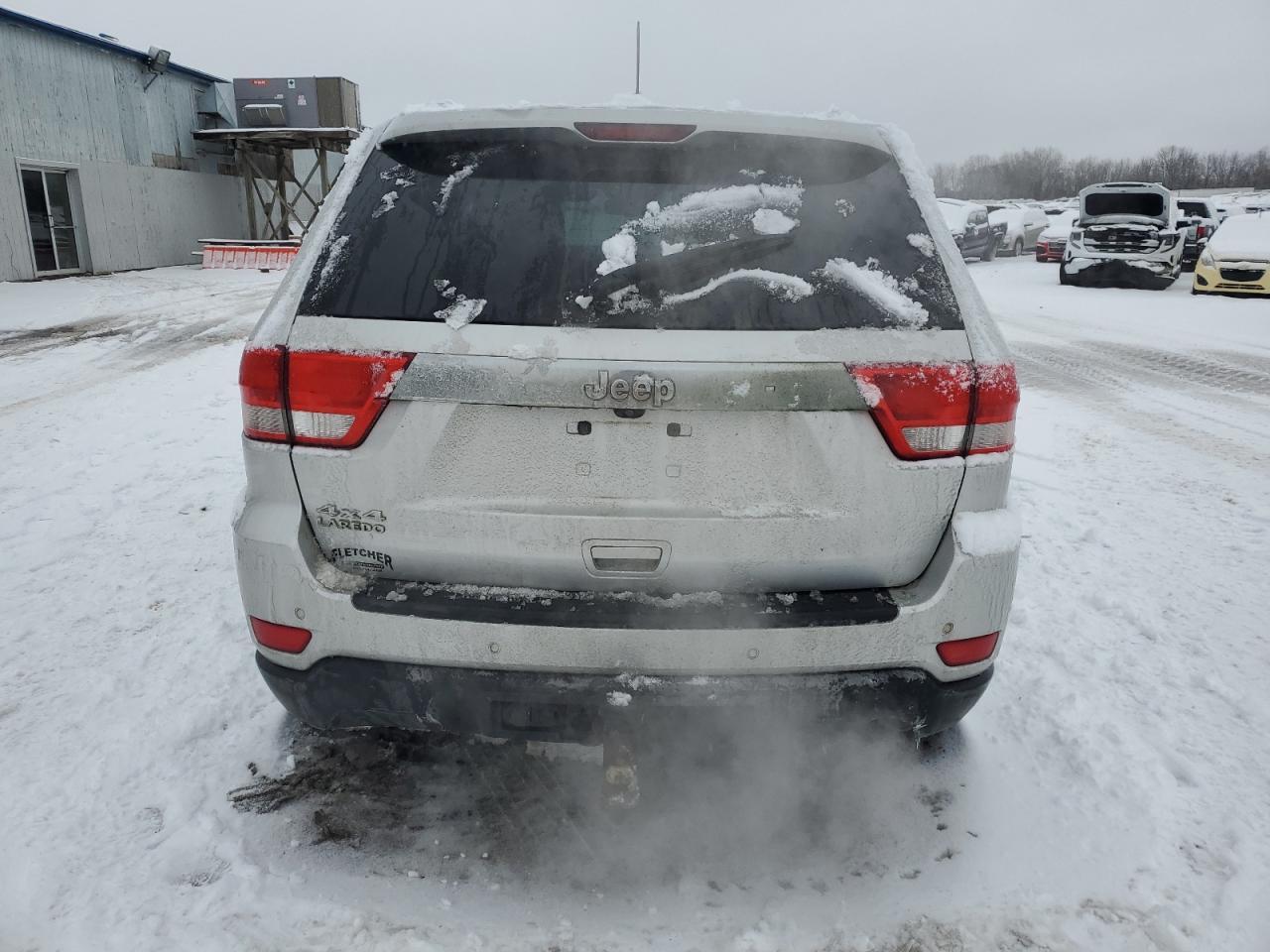 2011 Jeep Grand Cherokee Laredo - Фото 6
