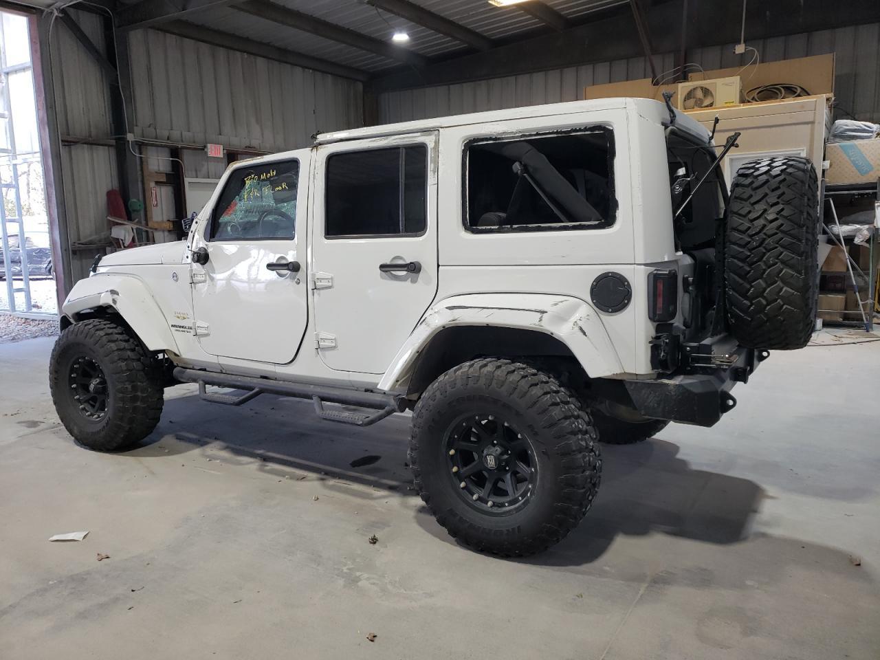 2014 Jeep Wrangler Unlimited Sahara - Фото 2