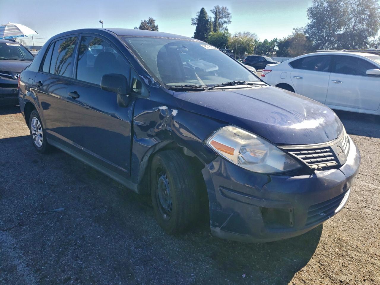 2011 Nissan Versa S - Фото 4