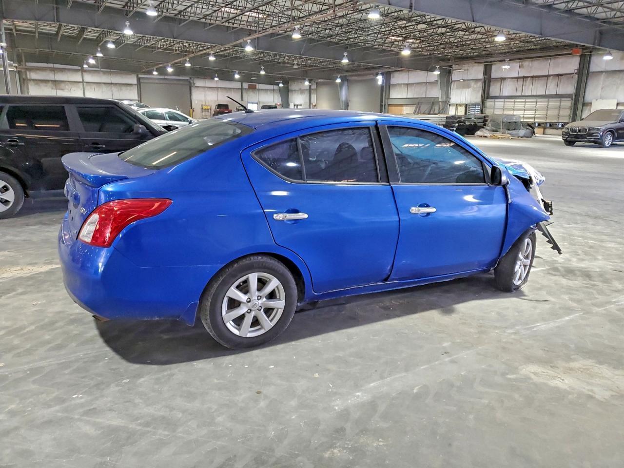 2014 Nissan Versa S - Фото 3