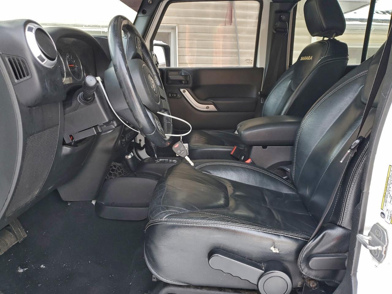 2013 Jeep Wrangler Unlimited Sahara - Фото 7