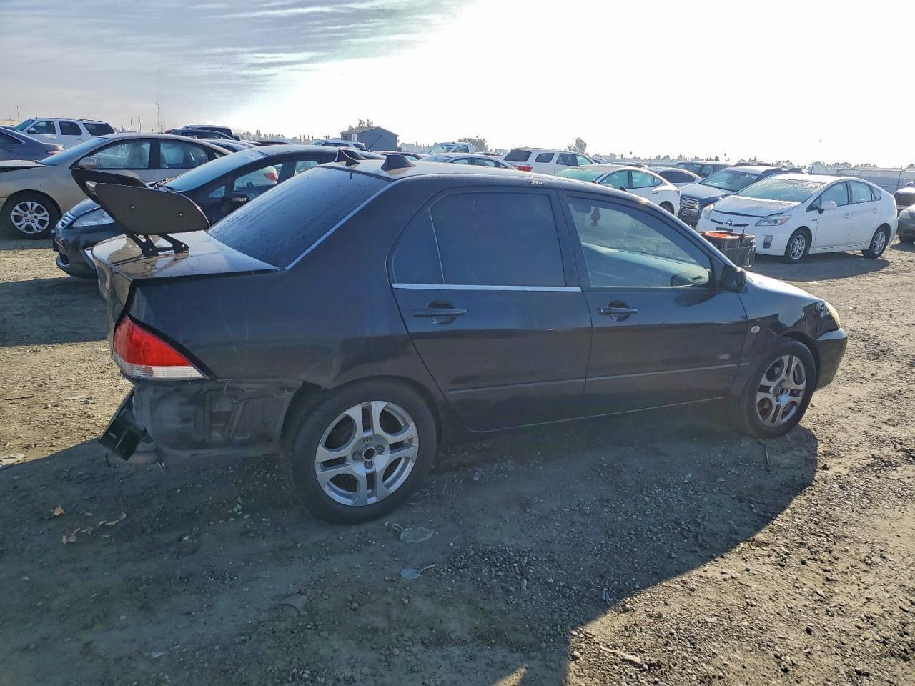 2004 Mitsubishi Lancer Es - Фото 3