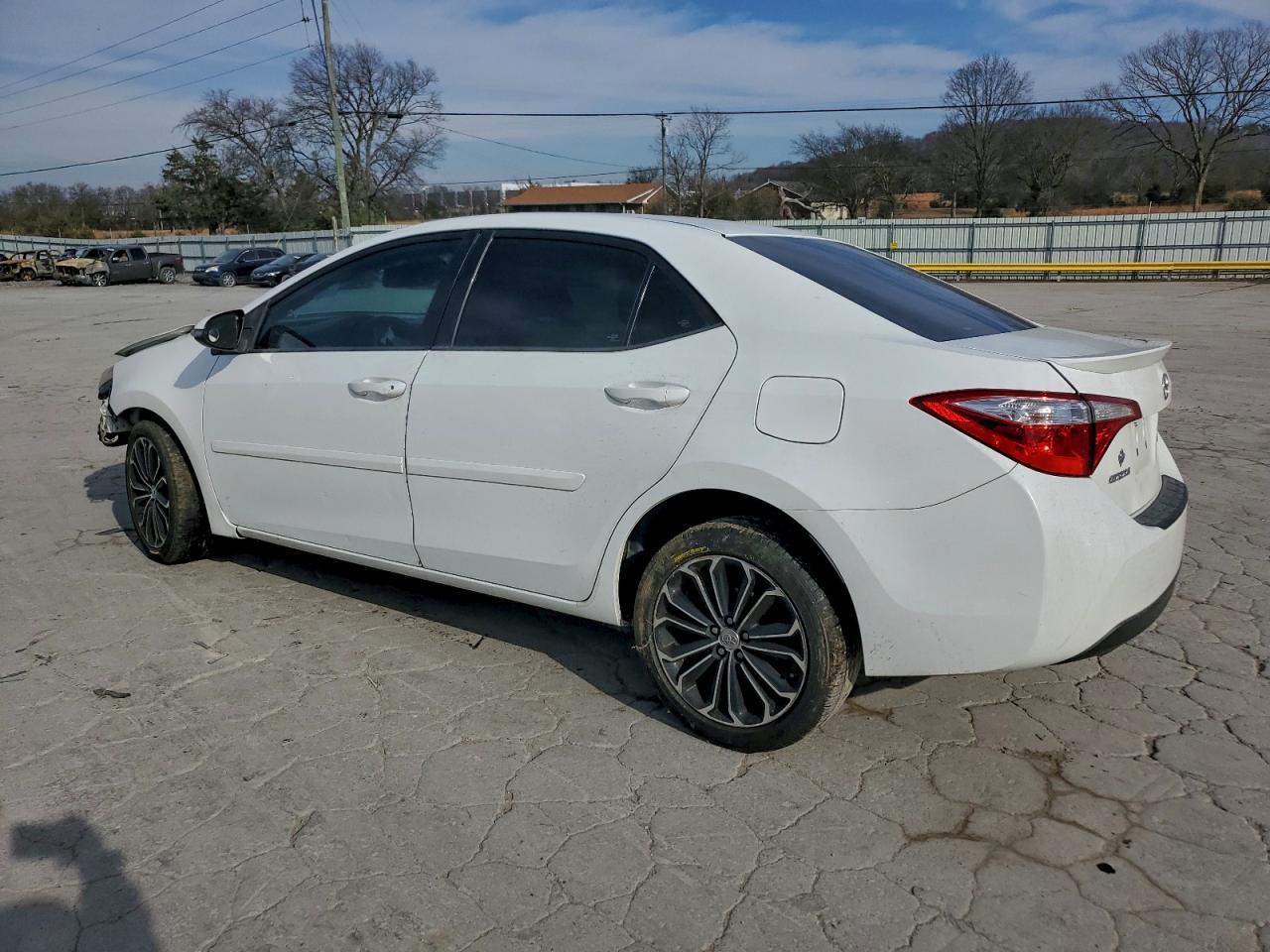 2014 Toyota Corolla L - Фото 2