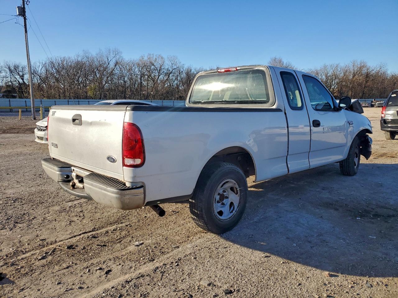 2003 Ford F150 - Фото 3