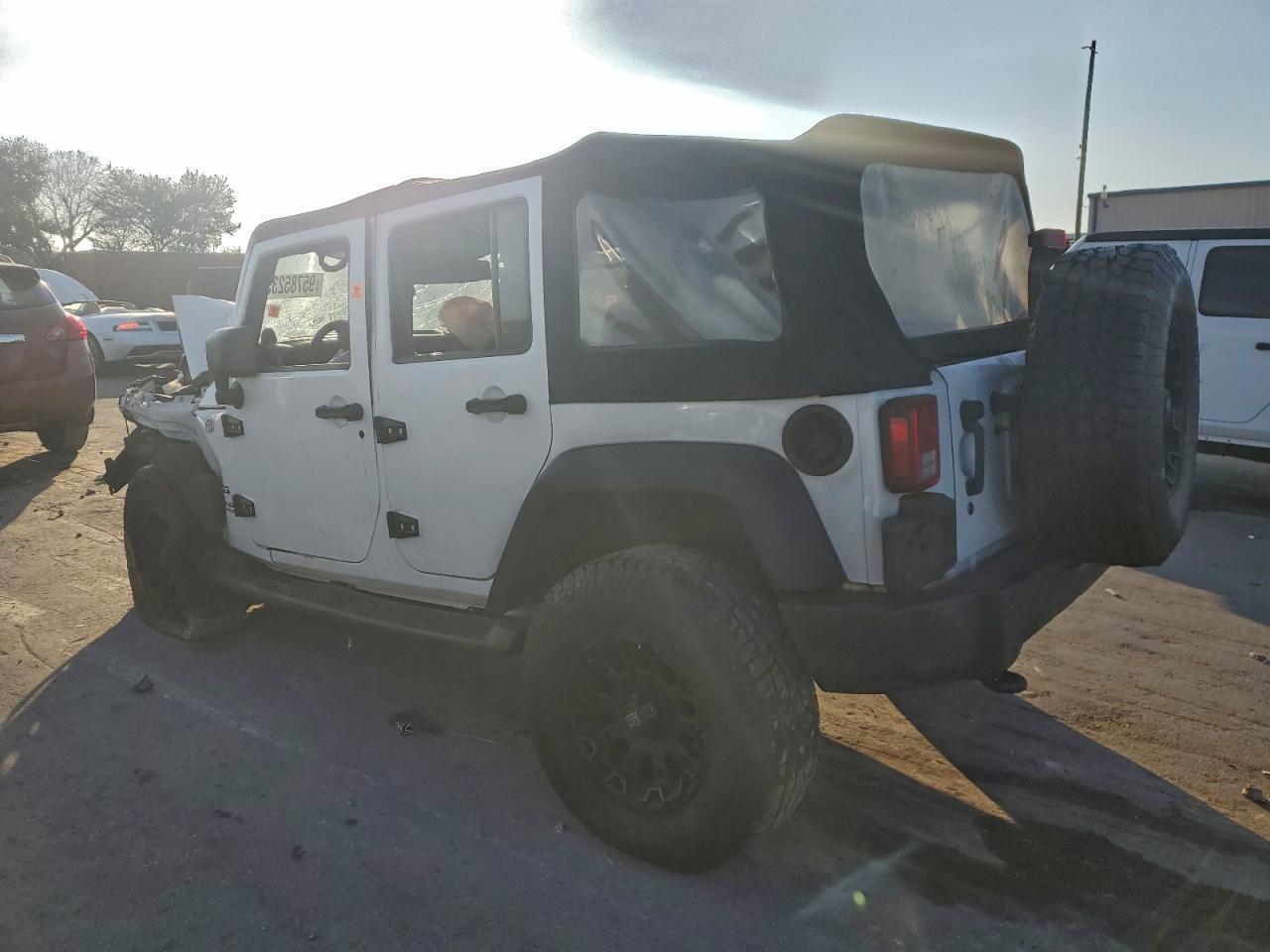 2014 Jeep Wrangler Unlimited Sport - Фото 2