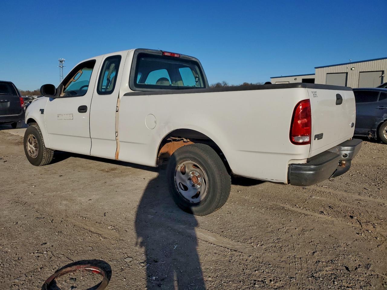2003 Ford F150 - Фото 2