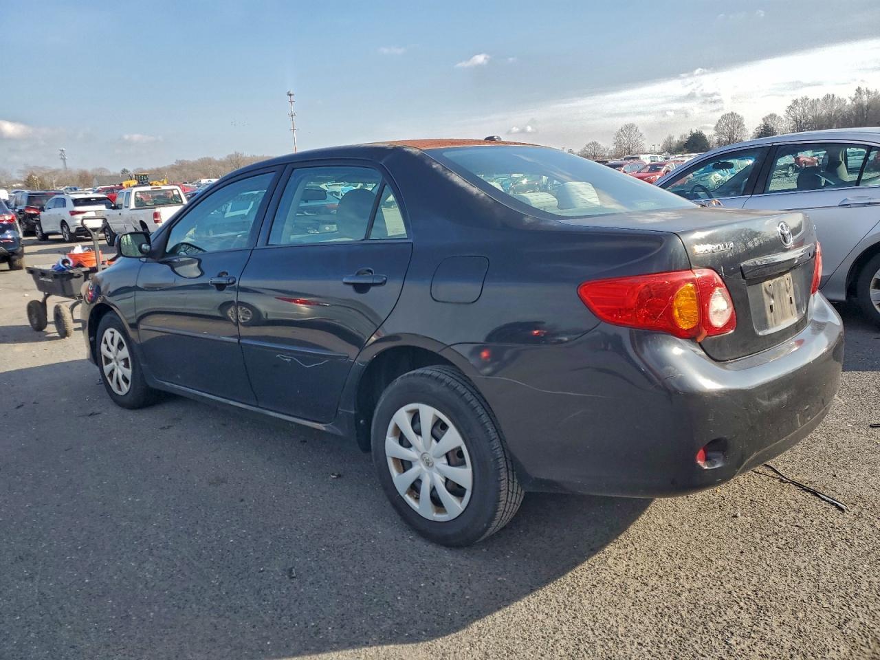 2010 Toyota Corolla Base - Фото 2